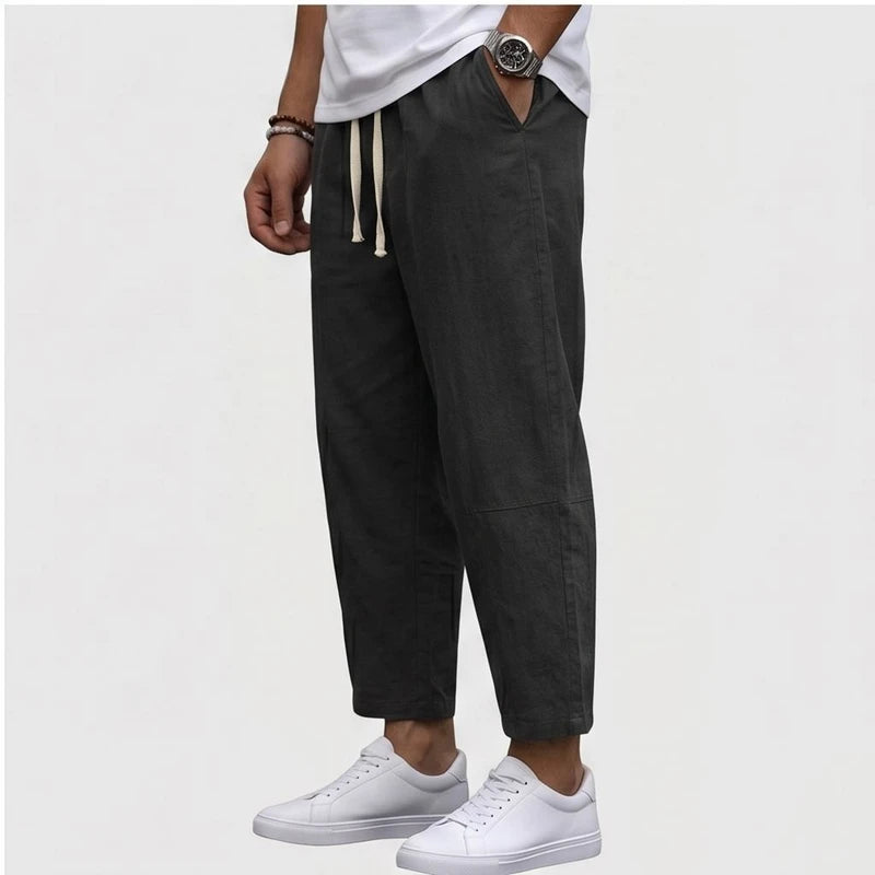 Model wearing Black Raymond - Men’s Drawstring Relaxed Linen Pants in studio - 2