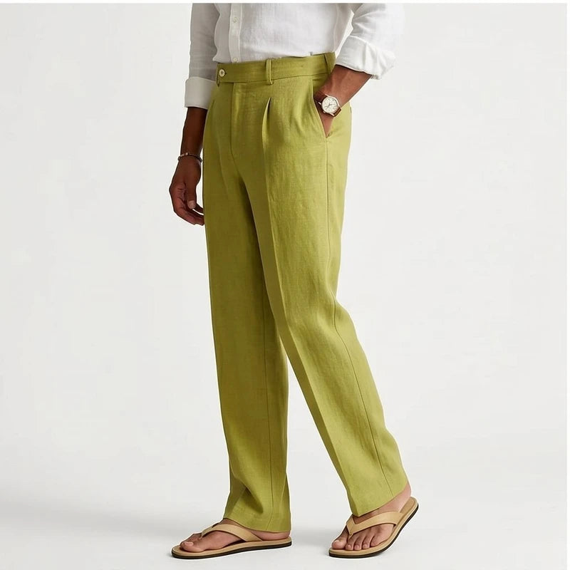 Model wearing Green Wyatt Straight Leg Linen Trousers in studio
