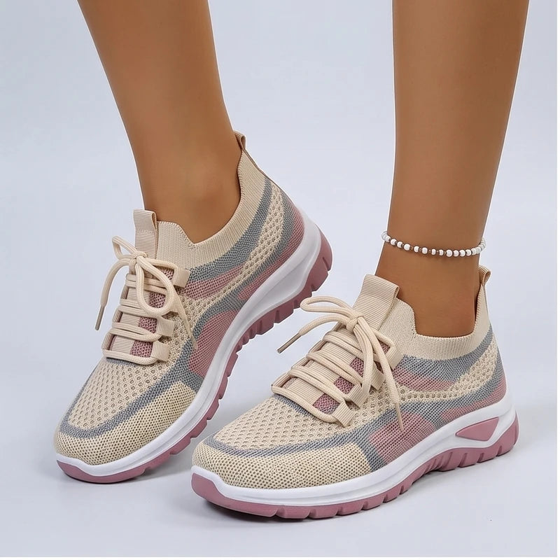 Model wearing Khaki Kesslyn Mesh Running Sneakers in studio