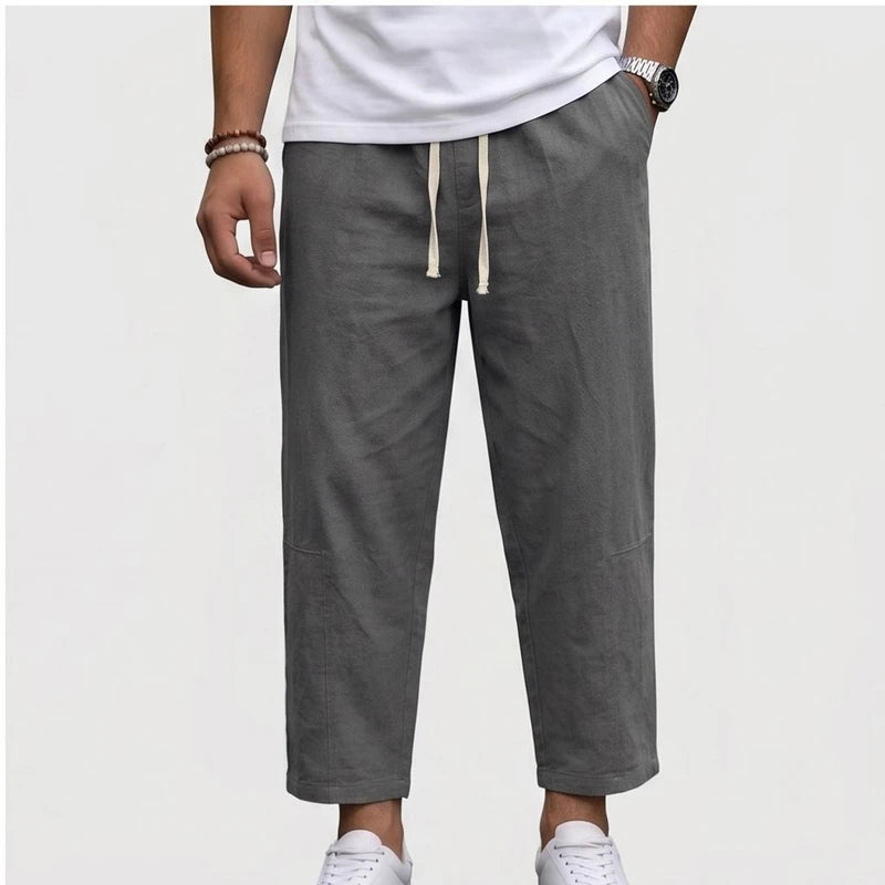 Model wearing Gray Raymond - Men’s Drawstring Relaxed Linen Pants in studio - 3