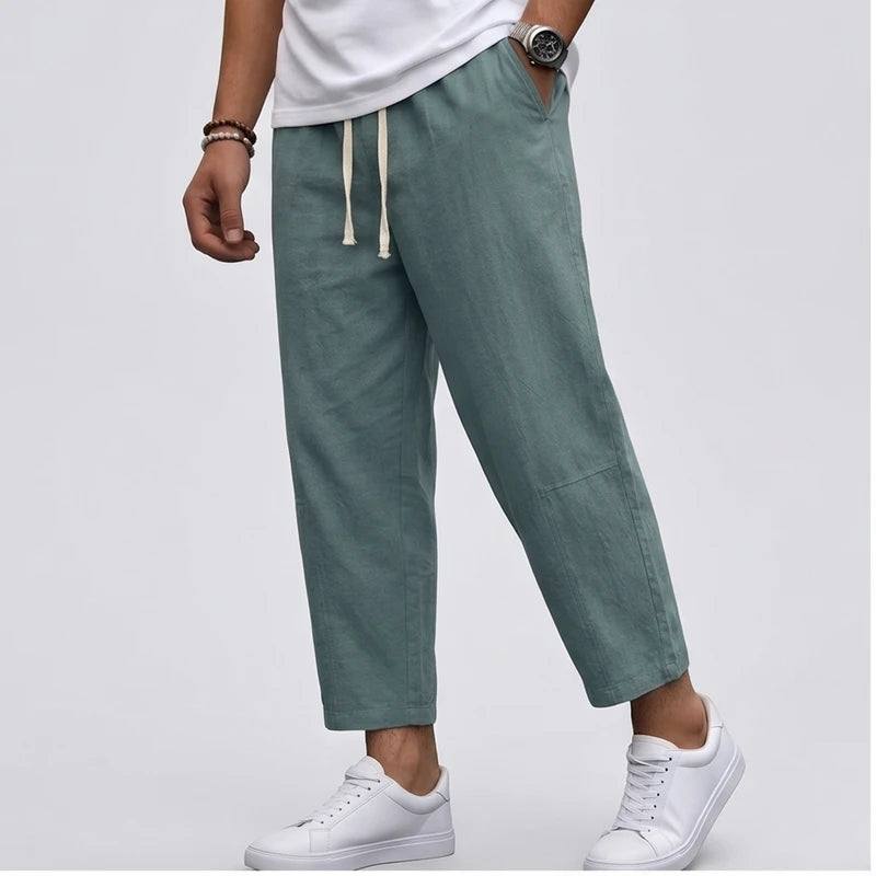 Model wearing Green Raymond - Men’s Drawstring Relaxed Linen Pants in studio