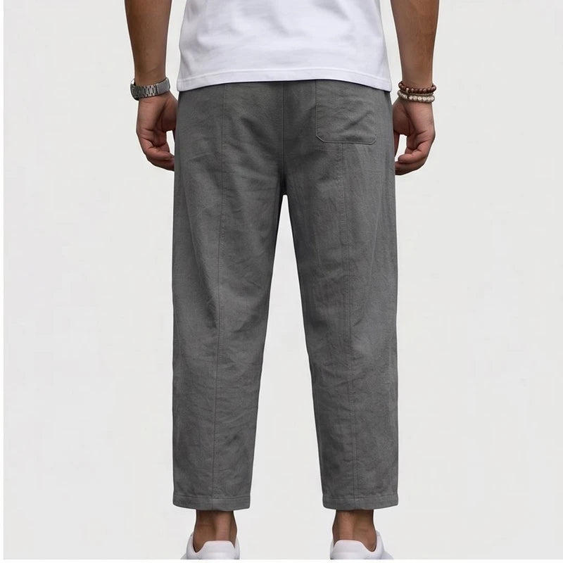 Model wearing Gray Raymond - Men’s Drawstring Relaxed Linen Pants in studio - 2