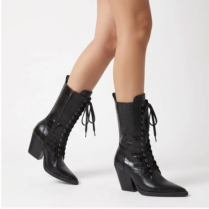 Model wearing Black Briarwood Croc-Embossed Lace-Up Boots in studio - 2