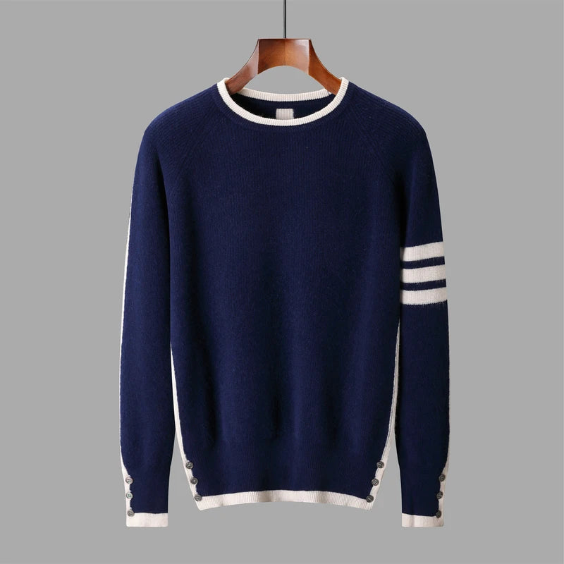 Navy blue sweater with white trim on a hanger against a gray background