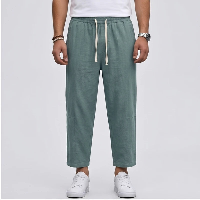 Model wearing Green Raymond - Men’s Drawstring Relaxed Linen Pants in studio - 2