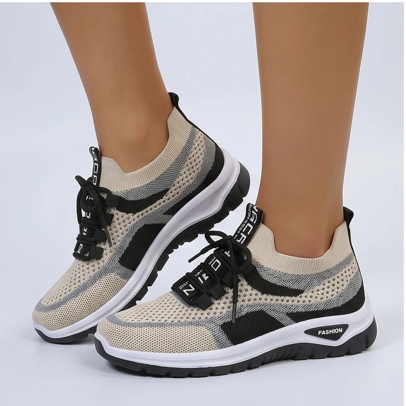 Model wearing Black Kesslyn Mesh Running Sneakers in studio - 2
