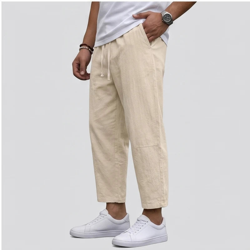 Model wearing Beige Raymond - Men’s Drawstring Relaxed Linen Pants in studio - 2