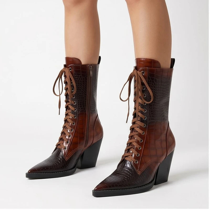 Model wearing Brown Briarwood Croc-Embossed Lace-Up Boots in studio