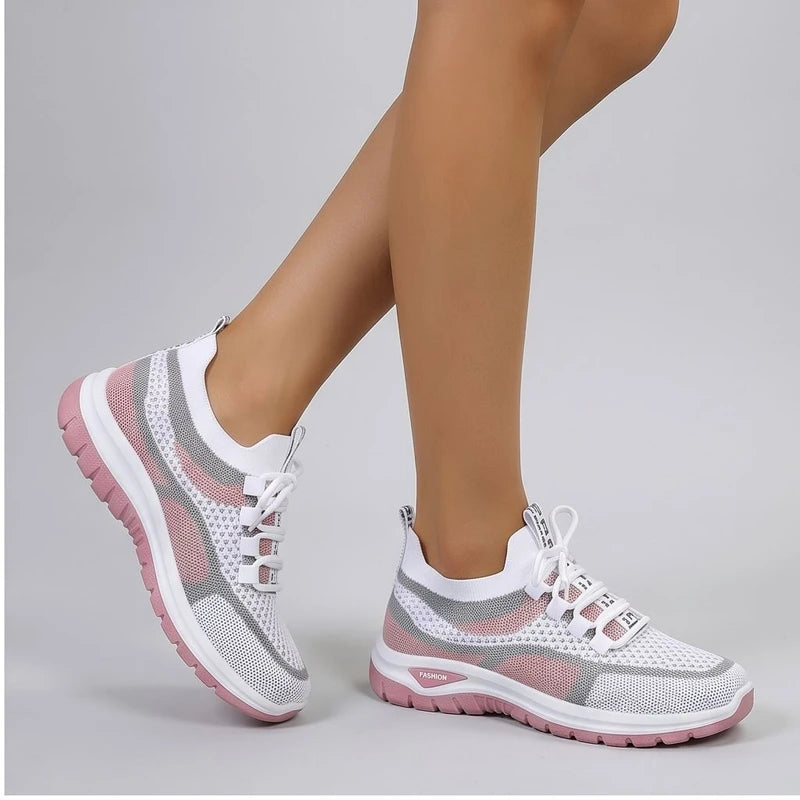 Model wearing Pink Kesslyn Mesh Running Sneakers in studio - 2