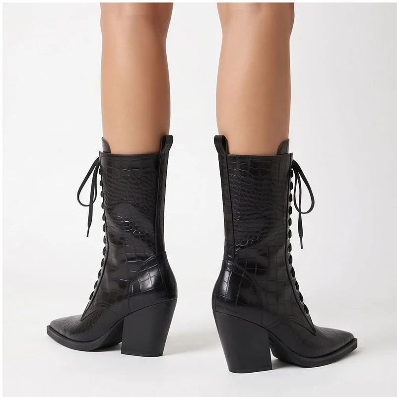 Model wearing Black Briarwood Croc-Embossed Lace-Up Boots in studio - 3