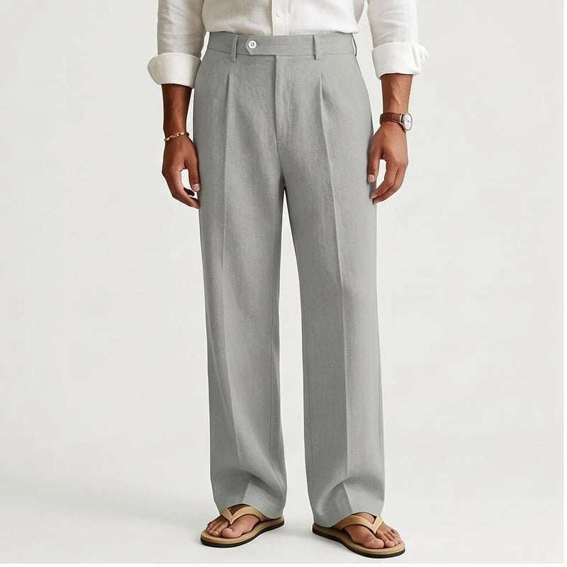 Model wearing Gray Wyatt Straight Leg Linen Trousers in studio