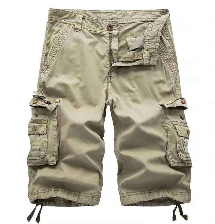 Khaki cotton utilitarian cargo shorts with multiple pockets.