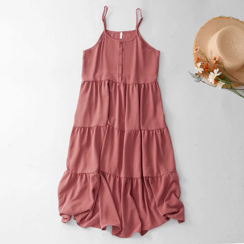 Pink cotton tiered A-line midi sundress.