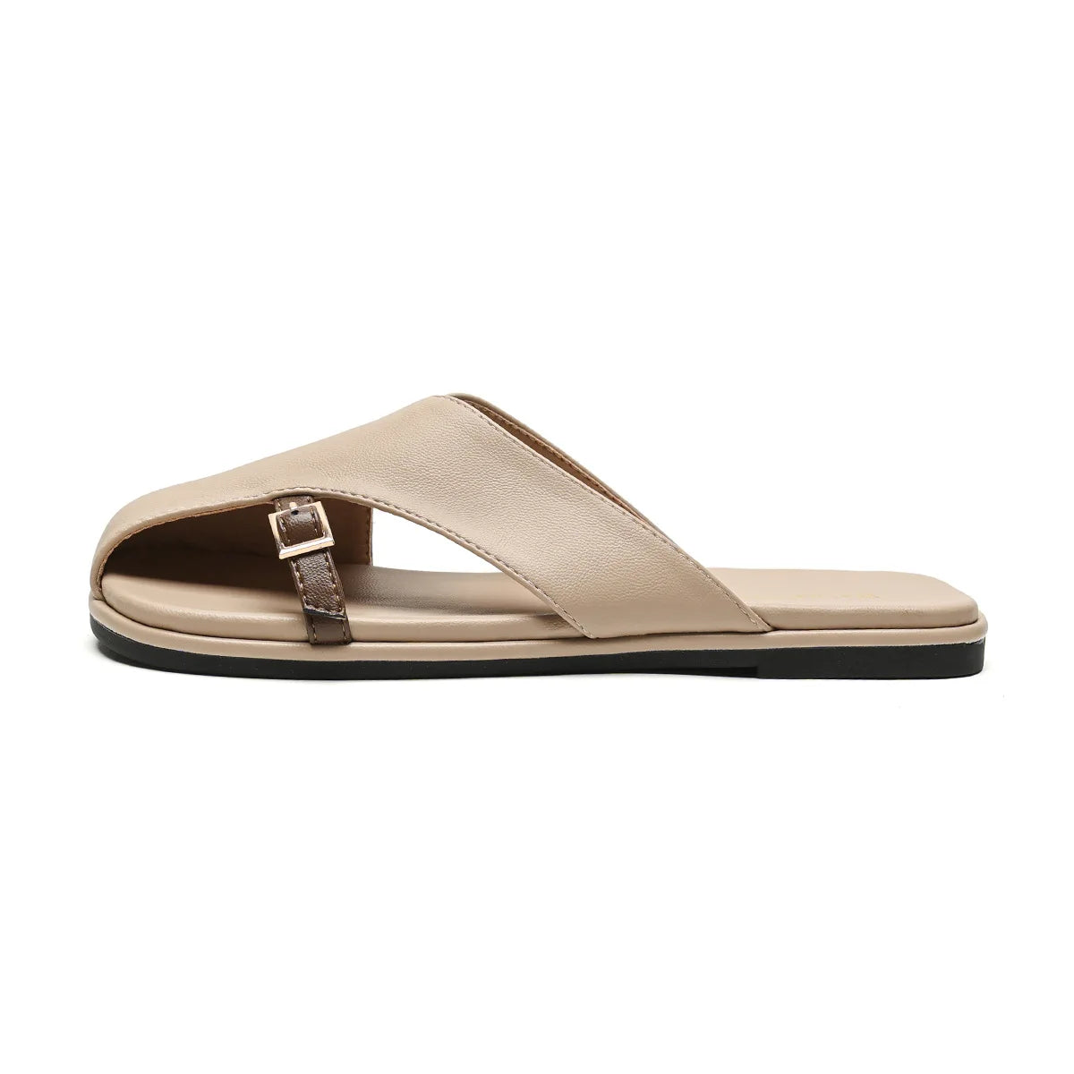 Beige sandal with a black sole on a white background
