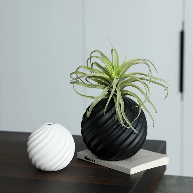 SPHERICAL CERAMIC VASE