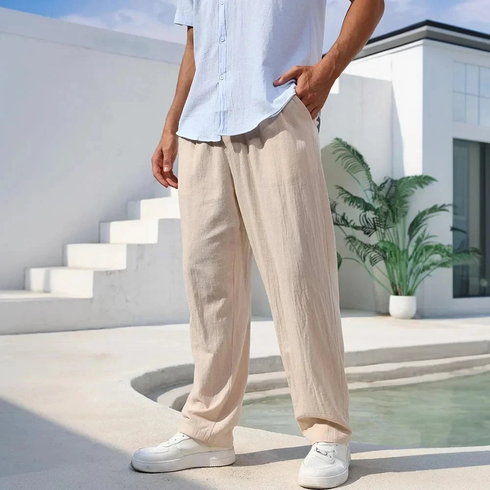 Men's beige linen casual trousers with a relaxed fit.