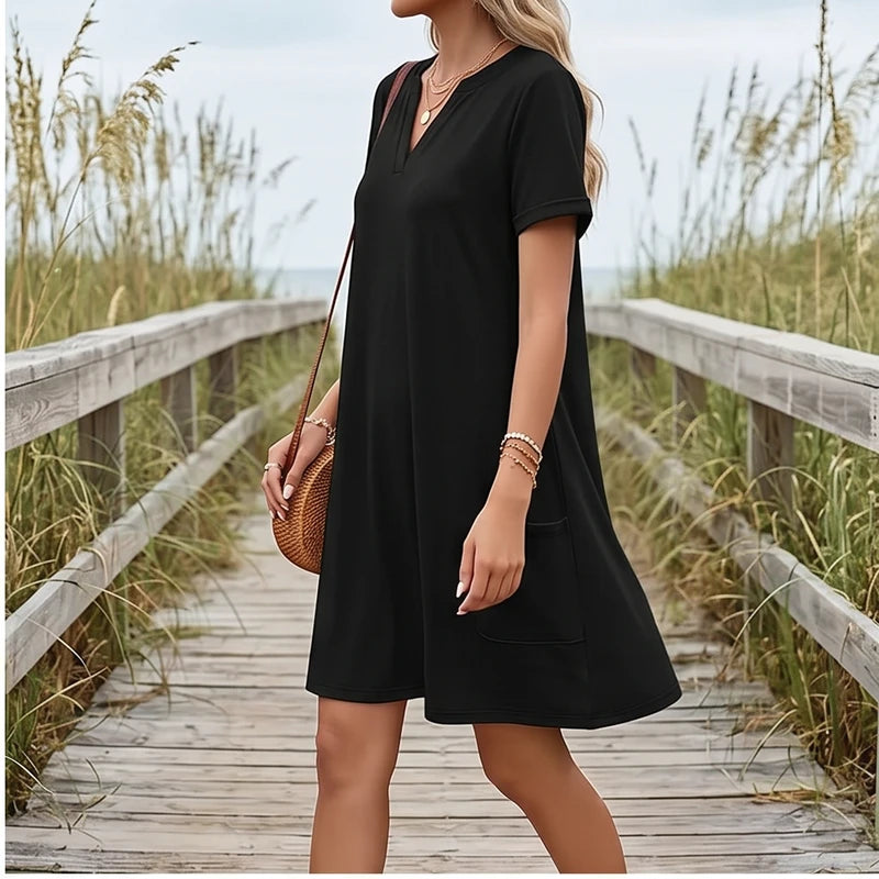 Model wearing A Women's Dress New Summer Casual V-Neck Wedding Loose Dress Short Sleeve Fashion Beach Vacation Wear dress outdoors - 2