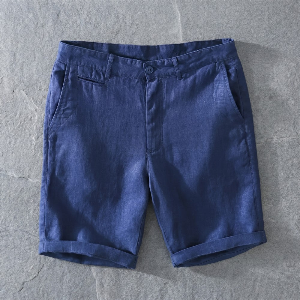 Blue linen casual shorts with cuffed hems.